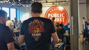 Man wearing Dice Throne Tournament T-shirt