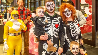 Family of four dressed as skeletons 