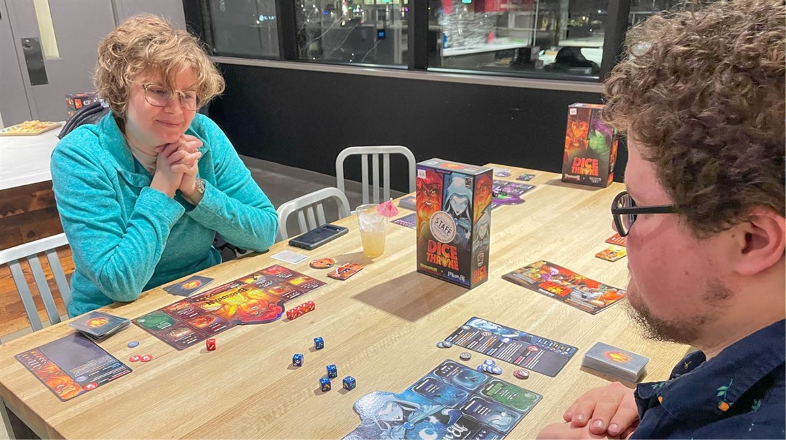 Couple playing board game in The Kitchen