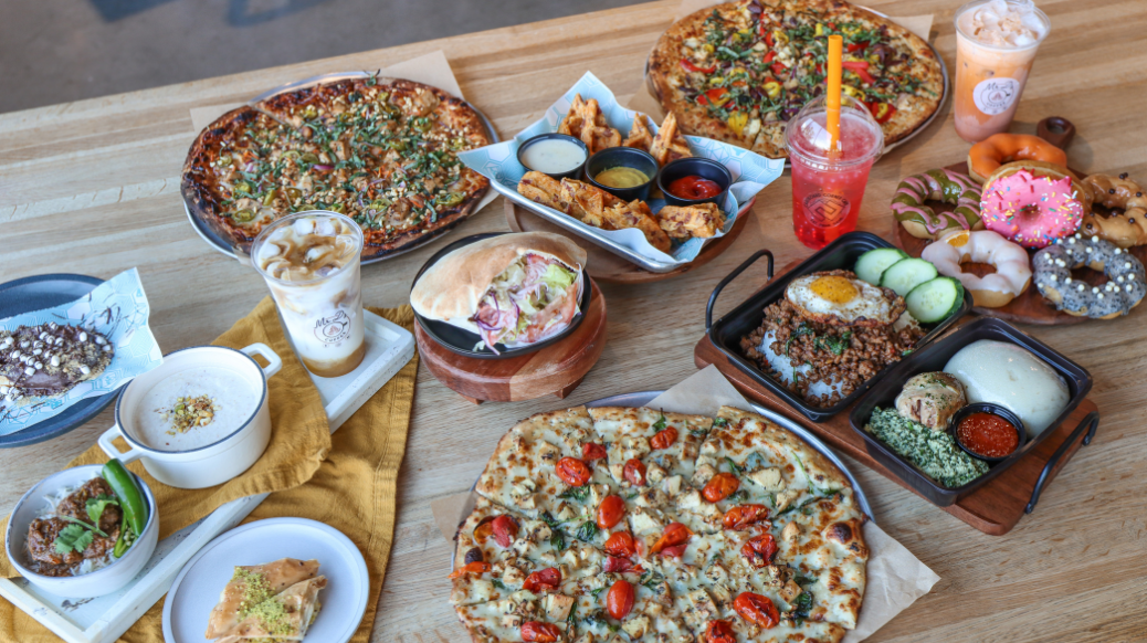 Spread of merchant food specials on the table.