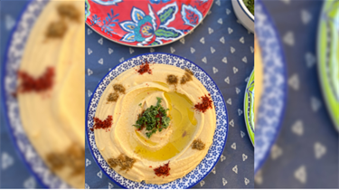 Hummus in bowl from KC Doner