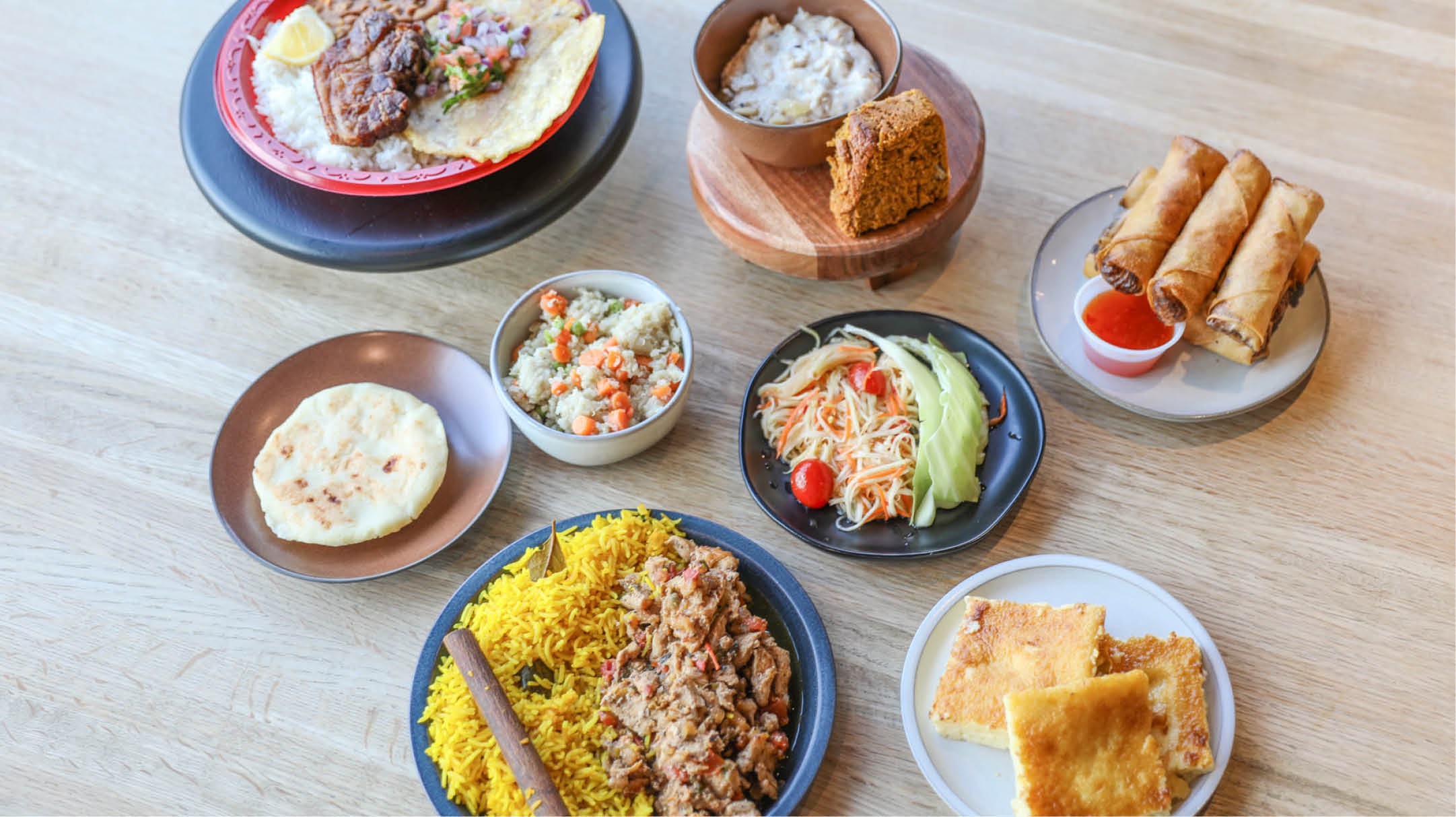 Table spread of food from a pop-up restaurant at the Public Market.