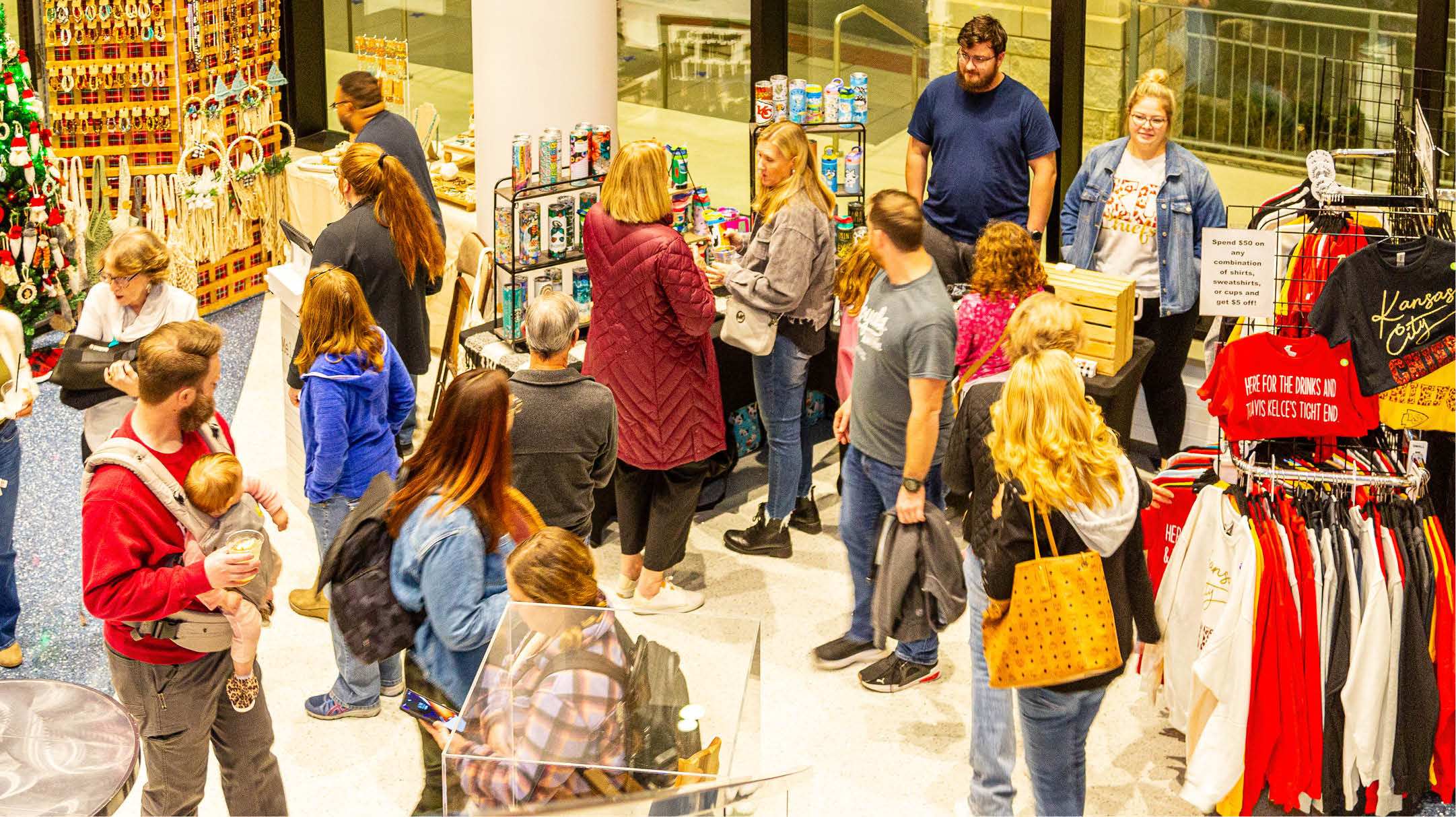 People shopping in Lenexa City Hall for Sip, Mingle & Jingle