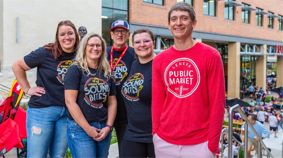 Group photo of five Public Market staff members