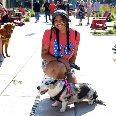 Woman and dog at Paw-triotic Pet Parade